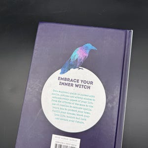 May include: A book with a dark purple cover, featuring a colourful bird illustration and the text "EMBRACE YOUR INNER WITCH." The book promises guidance on spells, potions, and witchy wisdom to enhance life.