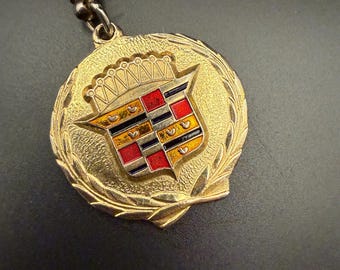 Vintage Cadillac Crest Medallion Keychain • Gold Tone Enamel Emblem • Classic Car Collectible • Automotive Memorabilia