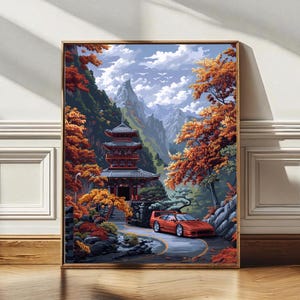 Könnte beinhalten: Gerahmter Kunstdruck, der eine japanische Pagode in einer herbstlichen Landschaft zeigt. Ein roter Sportwagen steht auf einer kurvenreichen Straße. Das Kunstwerk verwendet satte Farben von Rot, Orange, Grün und Blau mit einem detaillierten Bergpanorama.