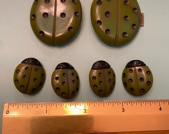 Bakelite Vintage 4 Buttons & 1 Belt Buckle | Green Lady Bugs | See Pics for Ss | Good condition, some rust on metal buckle | Free Shipping