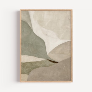 May include: A rectangular wall art print featuring an abstract composition of layered, organic shapes in muted tones of sage green, beige, cream, and taupe. The artwork is enclosed within a light-coloured wooden frame with a visible grain texture.