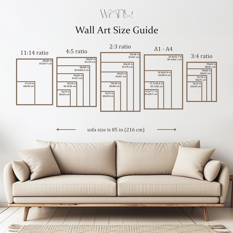 May include: A wall art size guide with various rectangular frame sizes, including 11x14 inches, 16x20 inches, and 24x36 inches. The guide also indicates that the sofa size is 85 inches. The text "Wall Art Size Guide" is at the top.