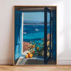 May include: A framed painting depicting an open window with bright blue shutters looking out onto a deep blue sea with sailboats. A small orange tree with several ripe orange fruits sits on the window ledge under a clear blue sky.