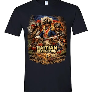 May include: Black t-shirt featuring a detailed graphic of the Haitian Revolution. The design includes historical figures in military attire, a flag, and the text "HAITIAN REVOLUTION" in gold lettering. The artwork is set against a backdrop of a battle scene.