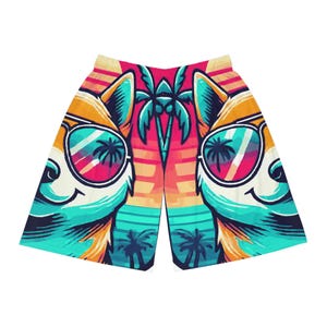 May include: Vibrant shorts featuring a cartoon dog wearing sunglasses with a tropical beach scene reflected in the lenses. The design includes palm trees, a sunset, and a color palette of orange, pink, teal, and yellow. The shorts have an elastic waistband.