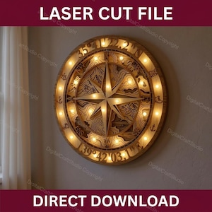 Könnte beinhalten: Wandkunst aus Holz mit Laser geschnittener Windrose und integrierten Lichtern. Das Design zeigt eine detaillierte Windrose, eine Bergkette und nautische Elemente. Der Text "LASER CUT FILE" und "DIRECT DOWNLOAD" sind sichtbar.