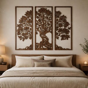 May include: A three-piece wall art set featuring a dark brown wooden tree design. Each rectangular panel displays a portion of a tree with intricate branches, leaves, and roots, framed in a matching dark wood border against a light background.