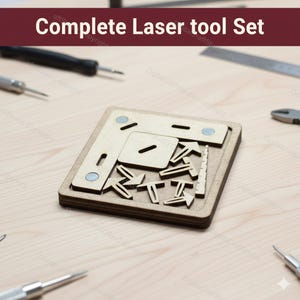 Peut inclure: Un ensemble complet d'outils laser avec le texte "Complete Laser tool Set" dans une bannière bordeaux. L'ensemble comprend un puzzle en bois avec diverses formes découpées, des aimants et plusieurs petits outils en métal.