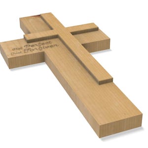 May include: A light-colored wooden cross with the engraved text "Not Perfect Just Forgiven." The cross has a simple, blocky design and is set against a white background. The wood grain is visible.
