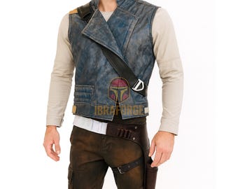 May include: A blue distressed vest with a high collar worn over a beige long-sleeve shirt, paired with dark brown cargo pants. A black shoulder strap with a silver buckle and a brown leather holster belt with ammunition loops are worn over the outfit.
