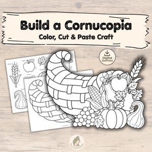 Puede incluir: Una actividad de manualidades imprimible en blanco y negro titulada Build a Cornucopia Color, Cut & Paste Craft. La imagen muestra una gran cesta tejida en forma de cuerno llena de frutas, verduras y hojas, junto a hojas de papel con elementos.