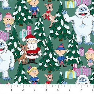 May include: A green fabric featuring a repeating pattern of cartoon characters including Santa Claus, elves, reindeer, and white abominable snowmen, interspersed with snow-covered pine trees and gift boxes, with a ruler showing 8 inches.