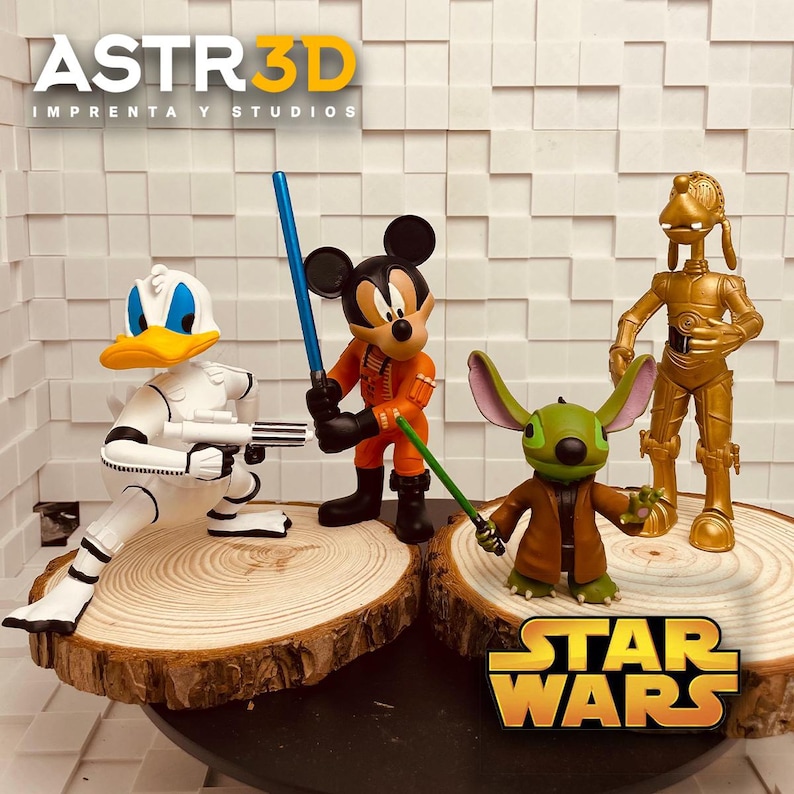 May include: A selection of 3D-printed figurines depicting Disney characters in Star Wars attire. Donald Duck is in a Stormtrooper outfit, Mickey Mouse as a pilot, and Stitch with a lightsaber. The Star Wars logo is displayed.