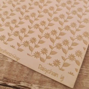 Daisychain large - laser engraved texture sheet pattern for rolling mill