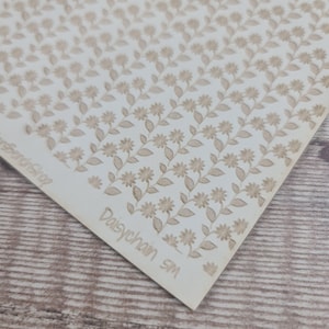 Daisychain small - laser engraved texture sheet pattern for rolling mill
