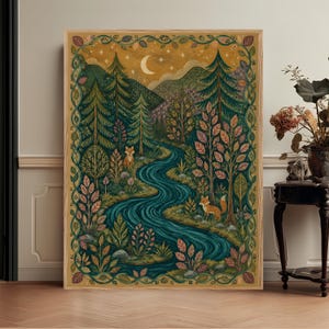 May include: A rectangular wall art print featuring a winding blue river flowing through a dense forest of green pine trees and colorful foliage. Two orange foxes are positioned along the riverbanks under a night sky with a crescent moon and stars.