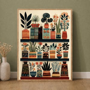 May include: A rectangular wall art print featuring three horizontal shelves filled with various potted plants and books. The illustration uses a palette of orange, blue, green, and cream, displaying diverse foliage and patterned ceramic containers.