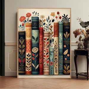 Könnte beinhalten: Ein gerahmter Wandkunstdruck mit einer vertikalen Anordnung von acht Buchrücken, die mit komplizierten Blumen- und Pflanzenillustrationen in Marineblau, Creme, Rot und Petrol verziert sind, mit zarten Stielen, die nach oben ragen.