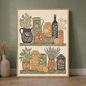 May include: A framed wall art print featuring two shelves filled with illustrated kitchenware including pitchers, jars, bottles, and bowls. The artwork displays a botanical theme with floral patterns in shades of olive green, mustard yellow, and terracotta.