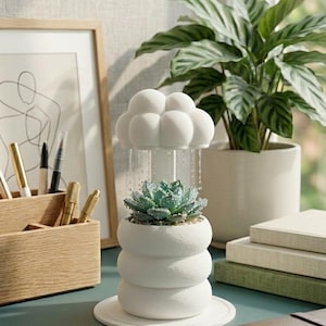 Suporte para rega em formato de nuvem de chuva impresso em 3D