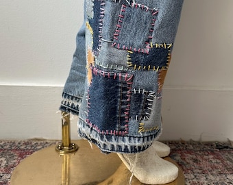 Denimjeans met patchwork Sashiko-stiksels – Details hergebruikte vintage denim