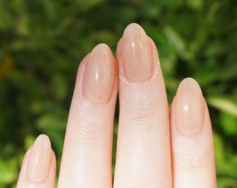 Champagne Fizz - Beige, nude milky jelly nail polish - shifting green, blue, gold fairy pearl.