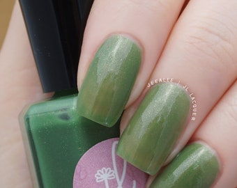Manoa - Sheer green jelly nail polish with subtle rose gold shimmer. 10-free, vegan, cruelty-free.