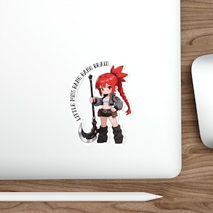 May include: A sticker featuring a cartoon illustration of a character with red hair in a braid, holding a scythe. The character wears a gray jacket, white top, and black boots. Text around the image reads "Little Miss Bang Bang Braid."