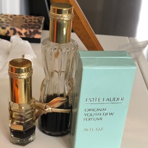 THREE Bottles of Youth Dew Perfume, Vintage, by Estee Lauder - one Original Box
