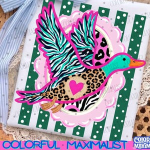 May include: A rectangular fabric panel featuring a flying duck graphic with a leopard print body, a bright pink heart, and zebra-striped wings. The duck is centered over a pink scalloped circle and a dark green background with white polka dots.