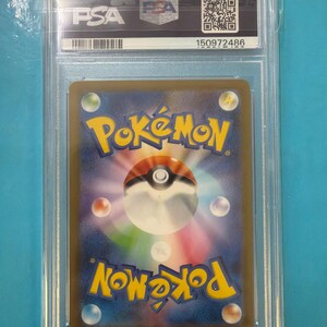 May include: A graded Pok&eacute;mon trading card encased in a clear plastic holder. The card's back features the Pok&eacute;mon logo in yellow and blue, with a white and red Pok&eacute; Ball design. The holder has a PSA label with a barcode and serial number.