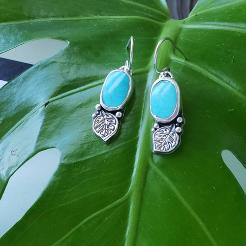 Turquoise and silver earrings shops with monstera leaf details