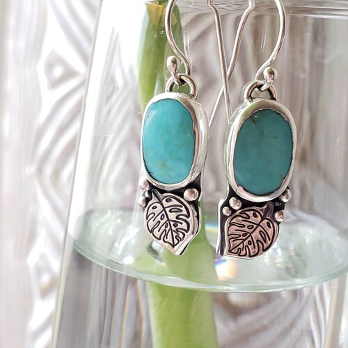 Turquoise and silver earrings shops with monstera leaf details