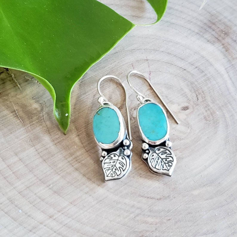 Turquoise and silver earrings shops with monstera leaf details