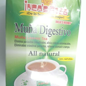 May include: A green box of Inca's Herbs Muña Digestivo tea. The box features a cup of tea on a saucer, and the text "All natural" and "100% NATURAL". The tea is advertised to eliminate intestinal parasites and relieve stomach cramps.