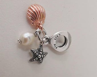 Charm tres en uno de estrella de mar y concha de perla Pandora