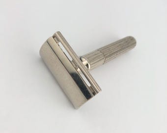 Maquinilla de afeitar de seguridad Gillette, patente de 1932, fabricada en Canadá en la década de 1950.