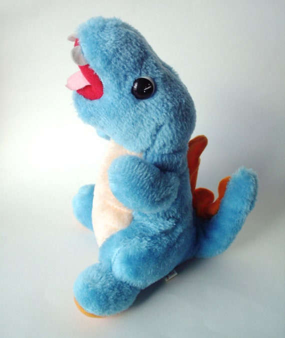 stuffed blue dinosaur