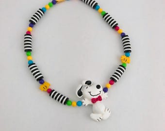 Collar vintage de Avon con Snoopy y Woodstock bailando