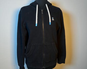 Sudadera con capucha negra con cremallera completa para hombre de Psycho Bunny, con gráfico de calavera de conejo, talla S