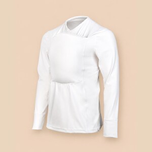 May include: A solid white long-sleeve shirt featuring a wrap-style neckline and a large, rectangular front panel overlay. The garment has fitted sleeves with cuffs and a smooth, opaque fabric construction, presented in a clean, minimalist design.