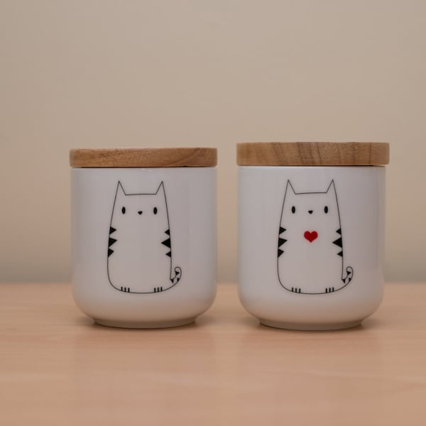 White ceramic canister with wooden lid and cute cat design