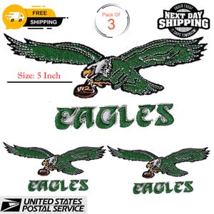 May include: Embroidered green and white patches featuring a soaring eagle clutching a football. The patches are 5 inches in size and include the word "EAGLES". The image shows a pack of three patches.