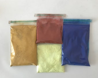 Poederpigmenten van kunstenaars, olieverf, rode oker, gele oker, blauw, bijenwas, hars, marmerstof, papier maken