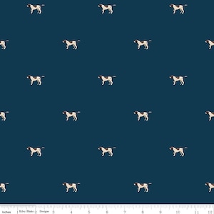 May include: Navy blue fabric with a repeating pattern of brown and white dogs. The dogs are in a standing pose, with their tails up. The fabric has a ruler along the bottom edge, with inch measurements.