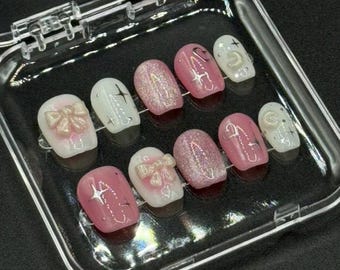 Uñas postizas rosas hechas a mano / Lazo 3D, brillo, diseño femenino