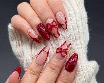 Uñas postizas con lazo rojo hechas a mano / Juego de uñas francesas con punta almendra brillante