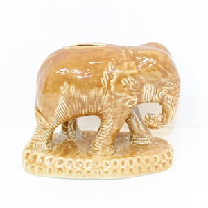 Antique Edwardian large ceramic elephant money box coin bank honey treacle glaze