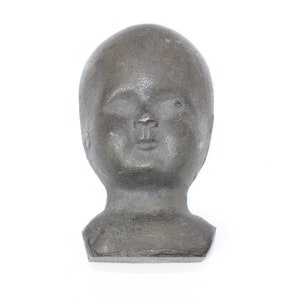 Antique rare bronze baby doll head face mold circa 1900s