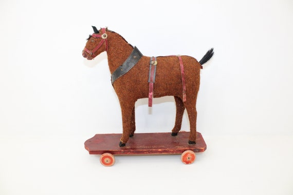 wheeled horse toy